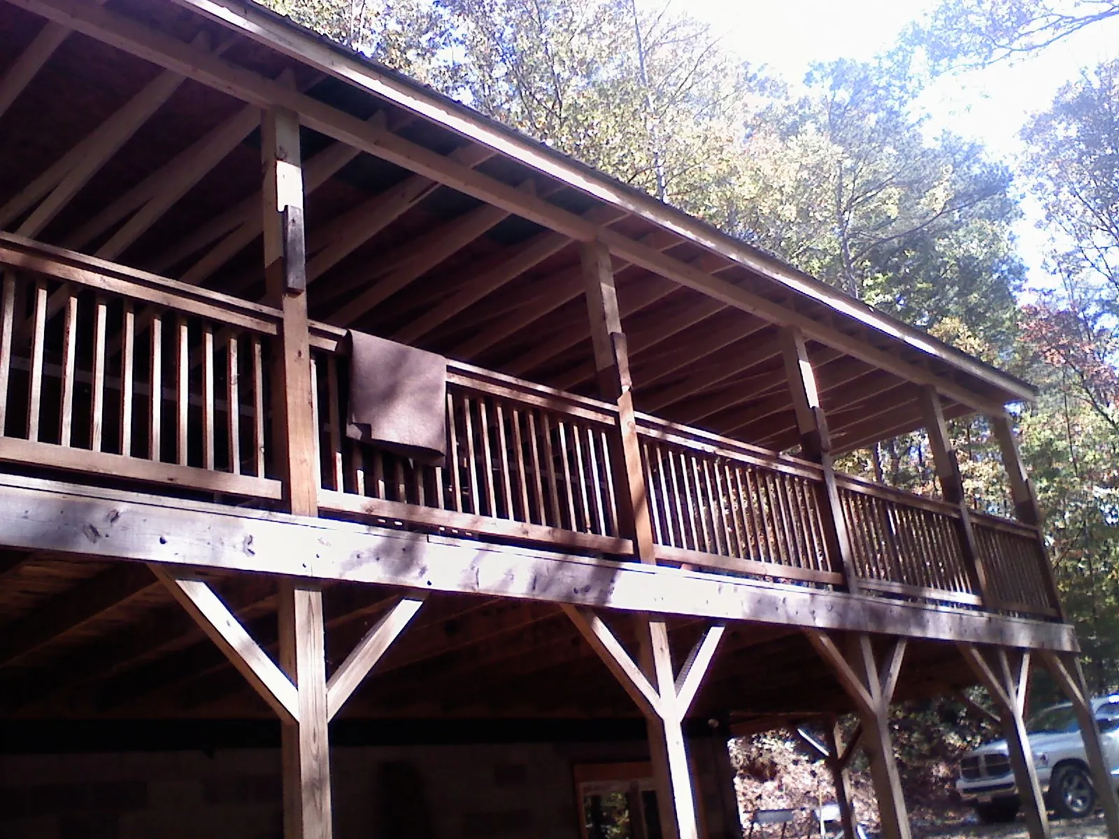 Timber framing under a new elevated porch and deck — Roof Leak Repair in Nathrop by Roofing Brothers